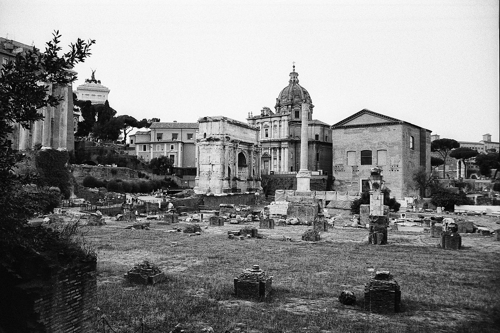 Arch of Septimius Severus and the Church of Santi Luca e Martina - Roman Forum in Rome, Italy