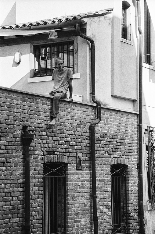 Barefoot On Brick Wall - Venice, Italy